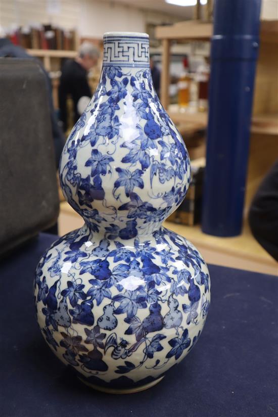 A Chinese blue and white double gourd vase height 34cm